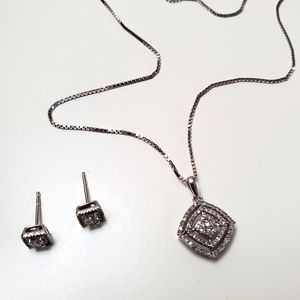 White gold 10k diamonds necklace and erring.